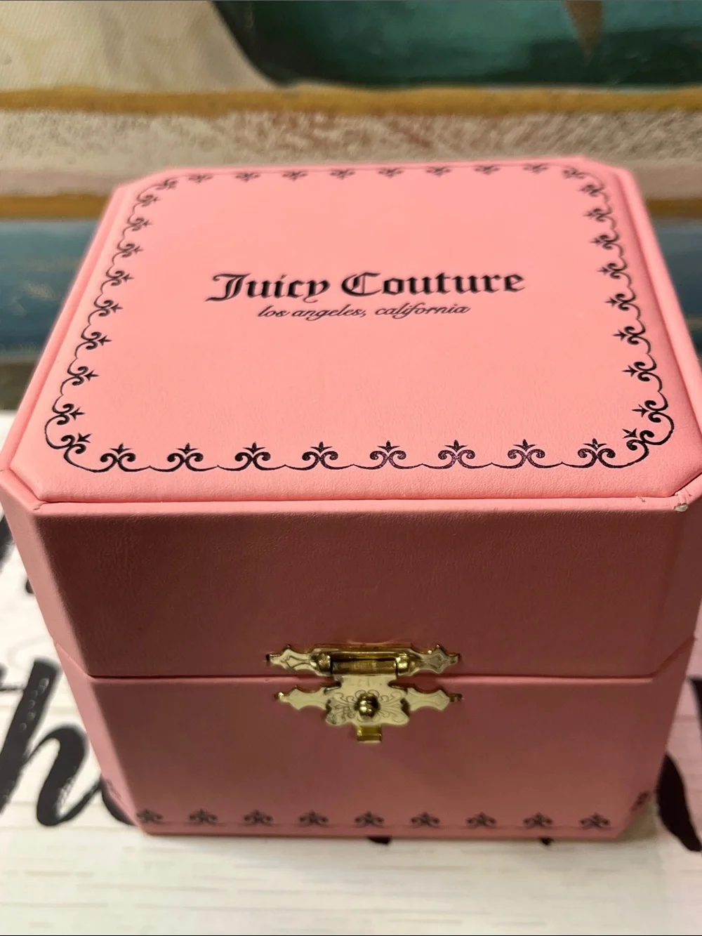 Juicy Couture gold tone